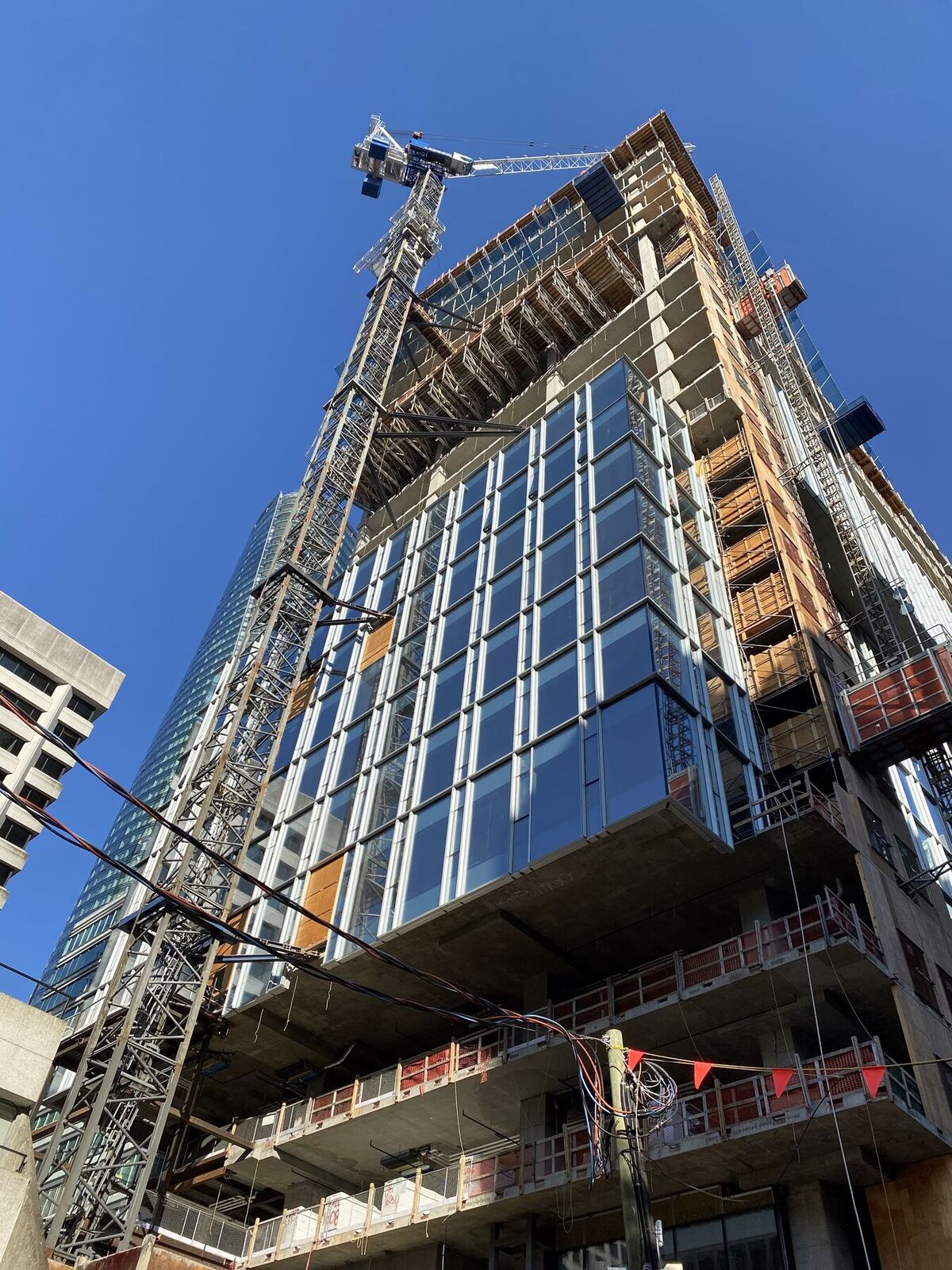 Residential tower under construction with formwork climbing the core